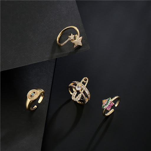 Title 4, 18K Gold Plated Copper Eye Shaped Ring. An eleg...