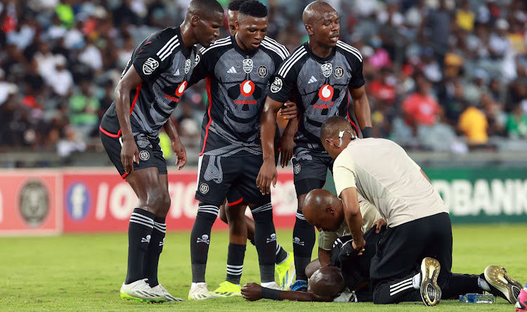 Makhehleni Makhaula of Orlando Pirates collapses during the Nedbank Cup, Last 16 match between Orlando Pirates and Hungry Lions at Orlando Stadium in Soweto.