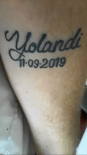 One of the tattoos that helped find police find the body.