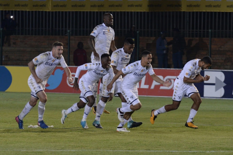 Wits celebrate during the MTN 8 quarter final match between Bidvest Wits and Golden Arrows at Bidvest Stadium on August 11, 2017 in Johannesburg, South Africa.