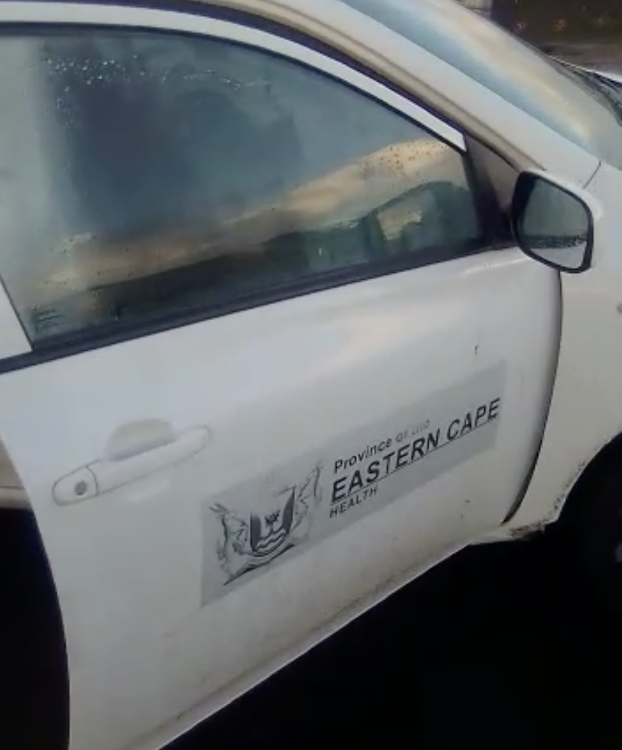 A screen shot from the video showing the Eastern Cape health department branding on a car with a driver who witnesses claim had 'blacked out'.