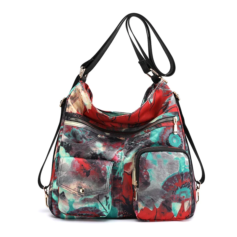 Sac à bandoulière imprimé grande capacité pour maman. Un sac spacieux et pratique pour les couches, biberons, etc.