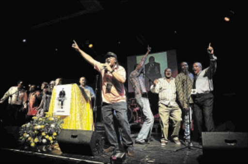 tribute: Condry Ziqubu leads artists in song during the memorial service for kwaito legend Senyaka Kekana at Bassline in Newtown, Johannesburg PHOTO: Veli Nhlapo