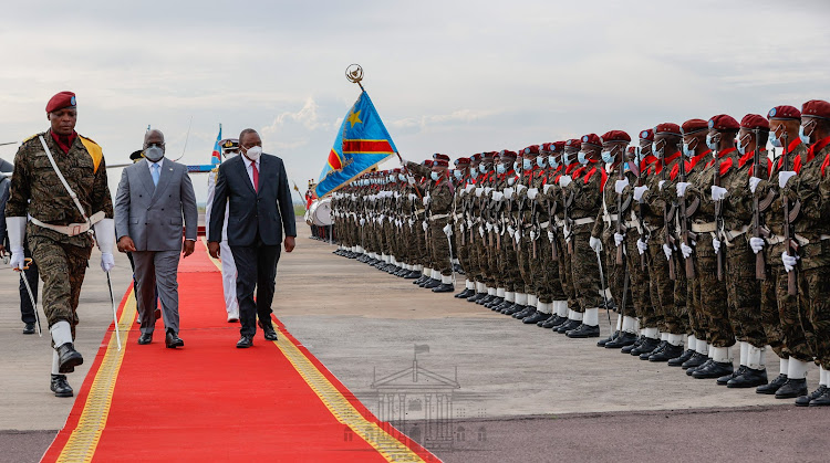 President Uhuru Kenyatta inspecting guard of honour mounted by a detachment of the Congolese military during his visit.