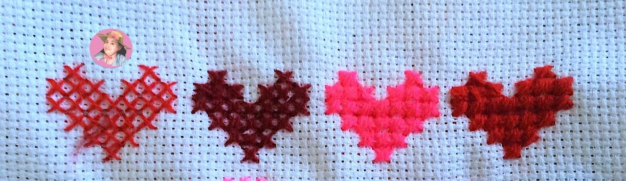 Hearts made in cross stitch 