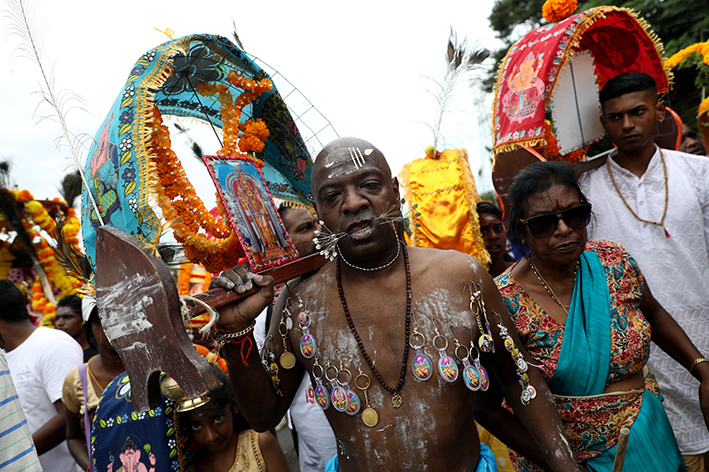 The festival sees devotees making devotional sacrifices through dance, food offerings and bodily self-mortification.