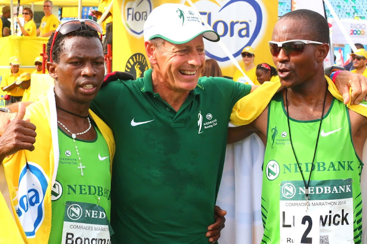 Nick Bester with Bongmusa Membu, left, and Ludwig MAmabolo at the 2014 Comrades Marathon in Durban.