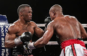 Thabiso  ‘The Rock’  Mchunu (left) and  Ilunga  ‘Junior’  Makabu  exchange blows during their WBC cruiserweight elimination bout in 2015.