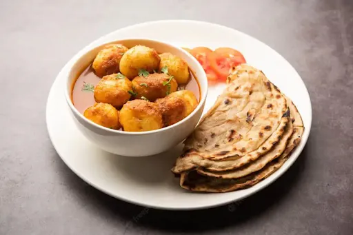 Anda Masala + (2 Lachha Paratha)