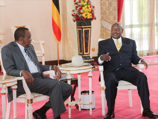 President Uhuru Kenyatta and Uganda's Yoweri Museveni holds talks at Entebbe State House, August 2015. Photo/PSCU