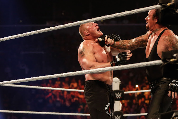 Brock Lesnar and The Undertaker battle it out at the WWE SummerSlam 2015 at Barclays Center of Brooklyn on August 23, 2015 in New York City.