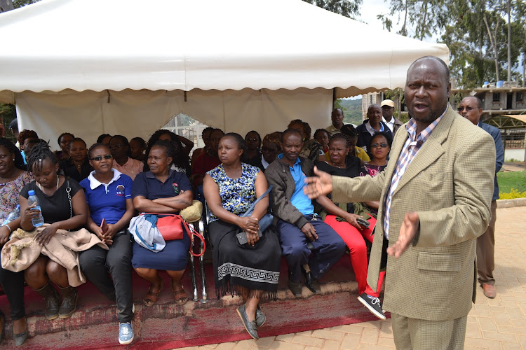 The Kitui Kenya National Union of Nurses Branch Secretary Newton Kimanzi addressing the health workers during the Slaray parade outside the Kitui governor’s office on Friday.