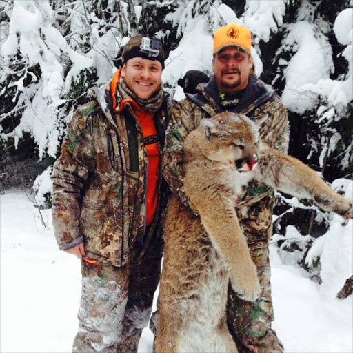 Kid Rock with mountain lion (c) Facebook