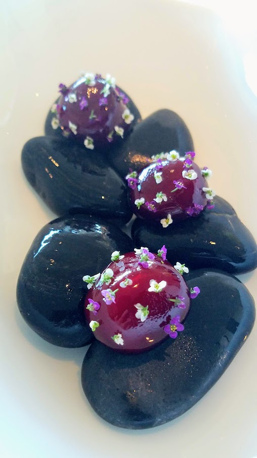 Snack of 'Beetroot Stone' Scallop and Horseradish at Geranium, a three Michelin star restaurant in Copenhagen