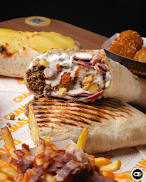 Photo n°1 de MULTI GUSTO Food-Court: Chamas Tacos, TaSty Pizza, Kebab'Boule à Villefranche-sur-Saône (Restauration rapide)