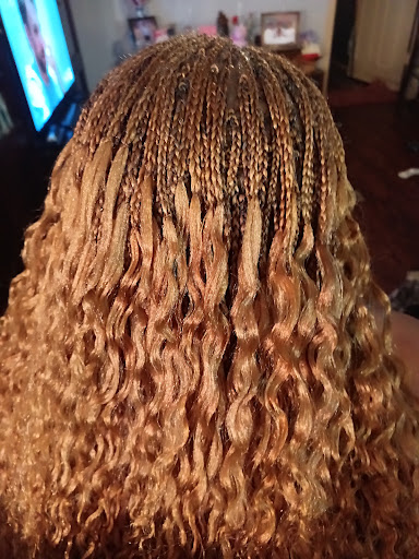 Simply Beautiful Hair Salon and Beauty Supply Logo