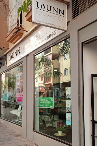IDUNN FORMACIÓN. Academia de peluquería y quiromasaje. Logo
