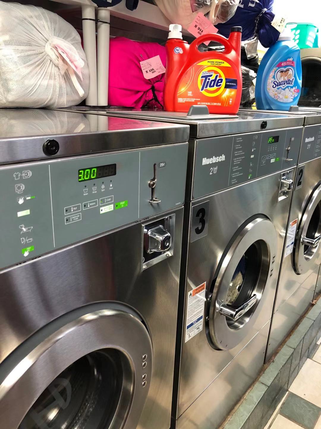 NEW Tian Tian Laundromat storefront and entrance in New York