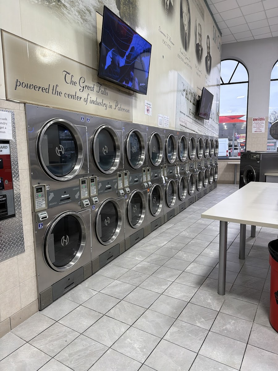 Showcase Laundromat facility with washing machines in Paterson