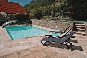 Photo n°1 de Cosmos Paysage à Tullins (Société de construction de piscine)