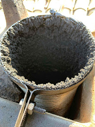 Photo n°17 de Flamme Service à Belleville (Ramoneur)