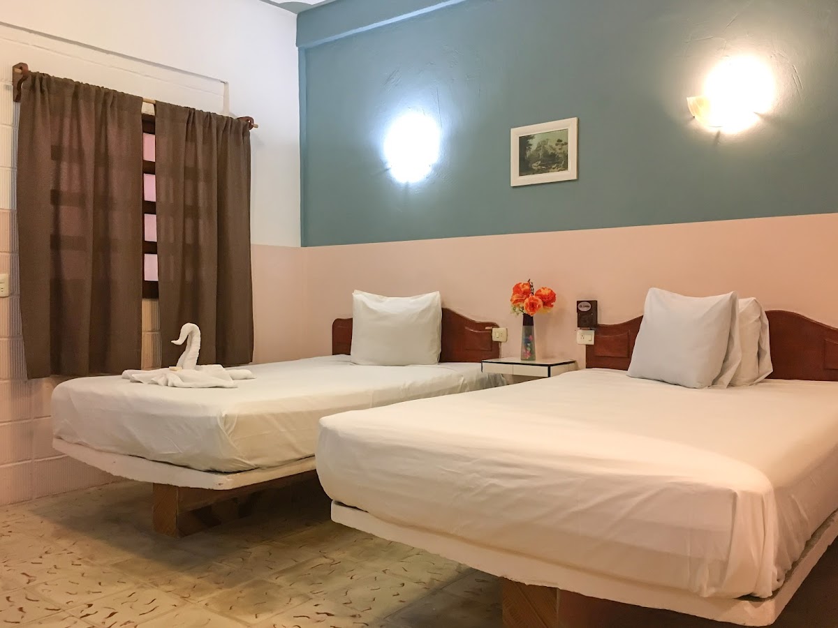 Casa Palma room with red curtains