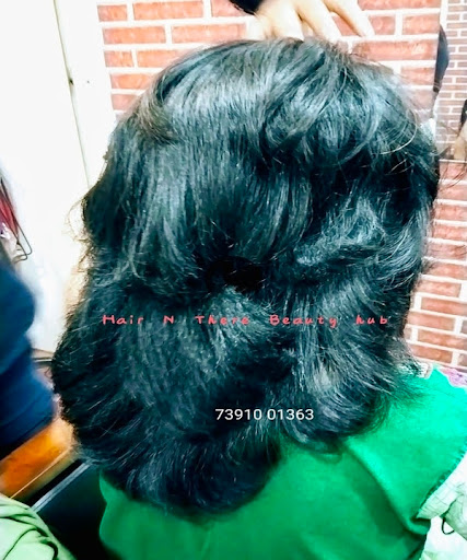 Curly hair transformation after hair cut and straight blow dry. post image