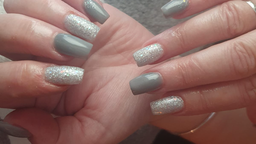 Naomi jades nails & Lashes Logo