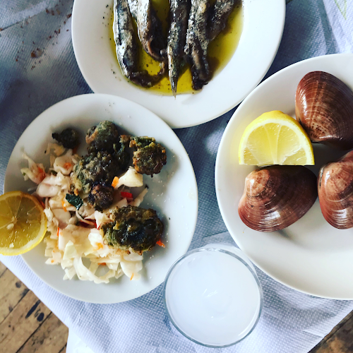 Ρίζες Βολιώτικο Τσιπουράδικο Μεζεδοπωλείο - Εστιατόριο