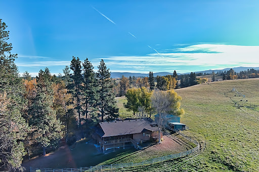 Travis Bulman, REALTOR®, Real Broker LLC, Licensed in IA and IL - Thumbnail