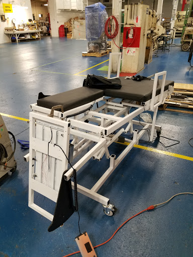 The MAT Table by Excellence in Rehabilitation Logo