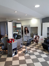 Photo n°1 de Art et Coiffure par Sylvie Silva Fournial à Naves (Salon de coiffure)