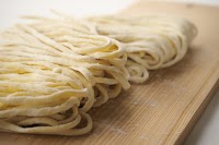 株式会社飯嶋製麺所