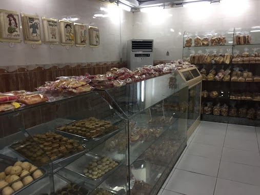 Al-Dawood Artistic Bakeries, Author: حسين السعيد