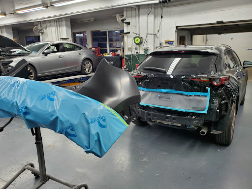 McBride Auto Body Inc. Logo