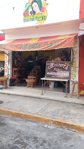 Ajaw pibil ruben y relleno negro