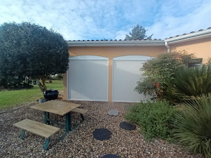 Photo n°6 de Komilfo Maison Du Store et de L'Enseigne à Marmande - Fenêtres, Volets, Pergolas, Stores, Portes, Portails, Portes de garage à Marmande (Magasin de stores et de rideaux)