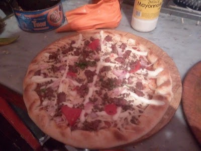 Photos of Pizzira Tonton Adouani Brothers
