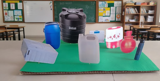 This image shows a school project model featuring different types of water storage and household… post image