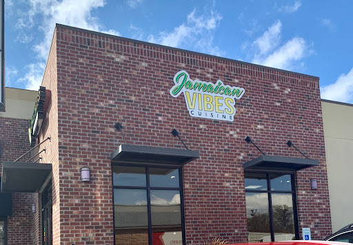Jamaican Vibes Cuisine (authentic Jamaican food) Logo