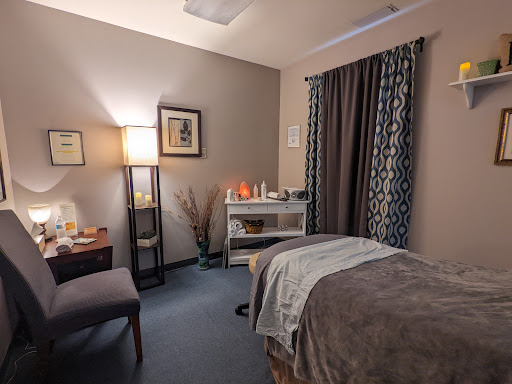 Relax and Revive Massage Logo