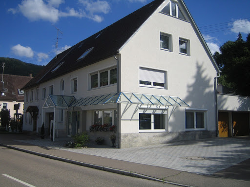 Hans M. Knaupp Logo