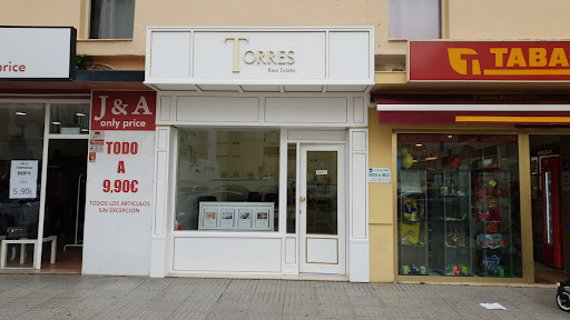 TORRES REAL ESTATE