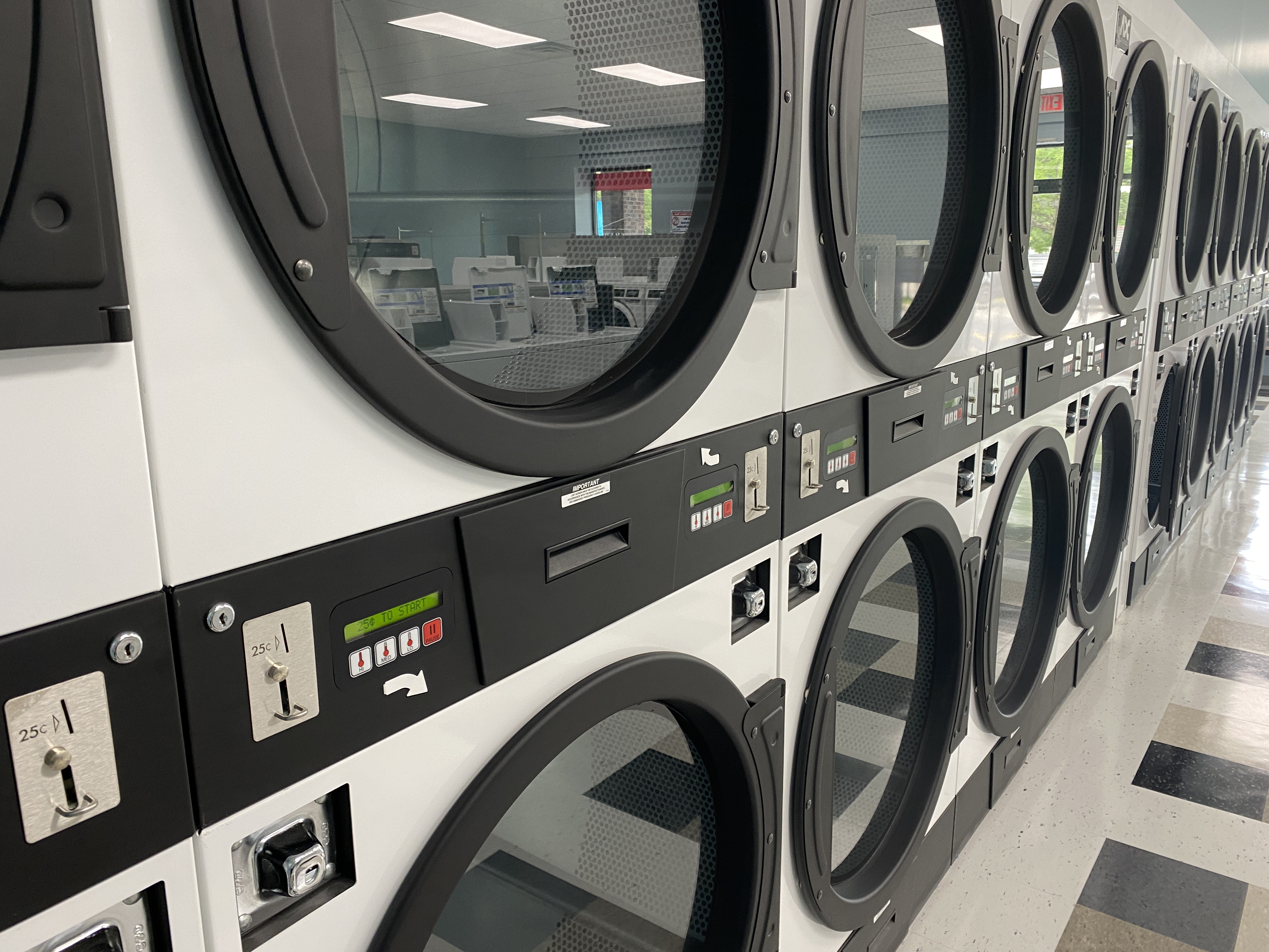 Clean laundry equipment at The Laundry House at Fisher in Rochester, NY