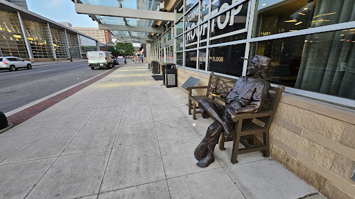 Johnny Appleseed statue on bench - Thumbnail