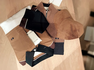 Photo n°14 de Peinturier Fougères : vêtement homme à Fougères (Magasin de chaussures)