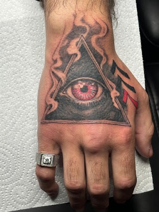 Prophecy Tattoo and pinky Piercings Ilford