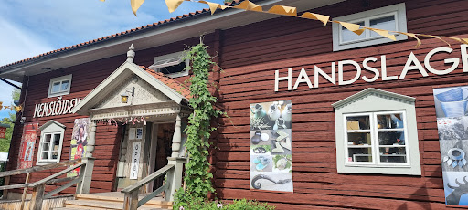 Rättviks Hemslöjd Logo