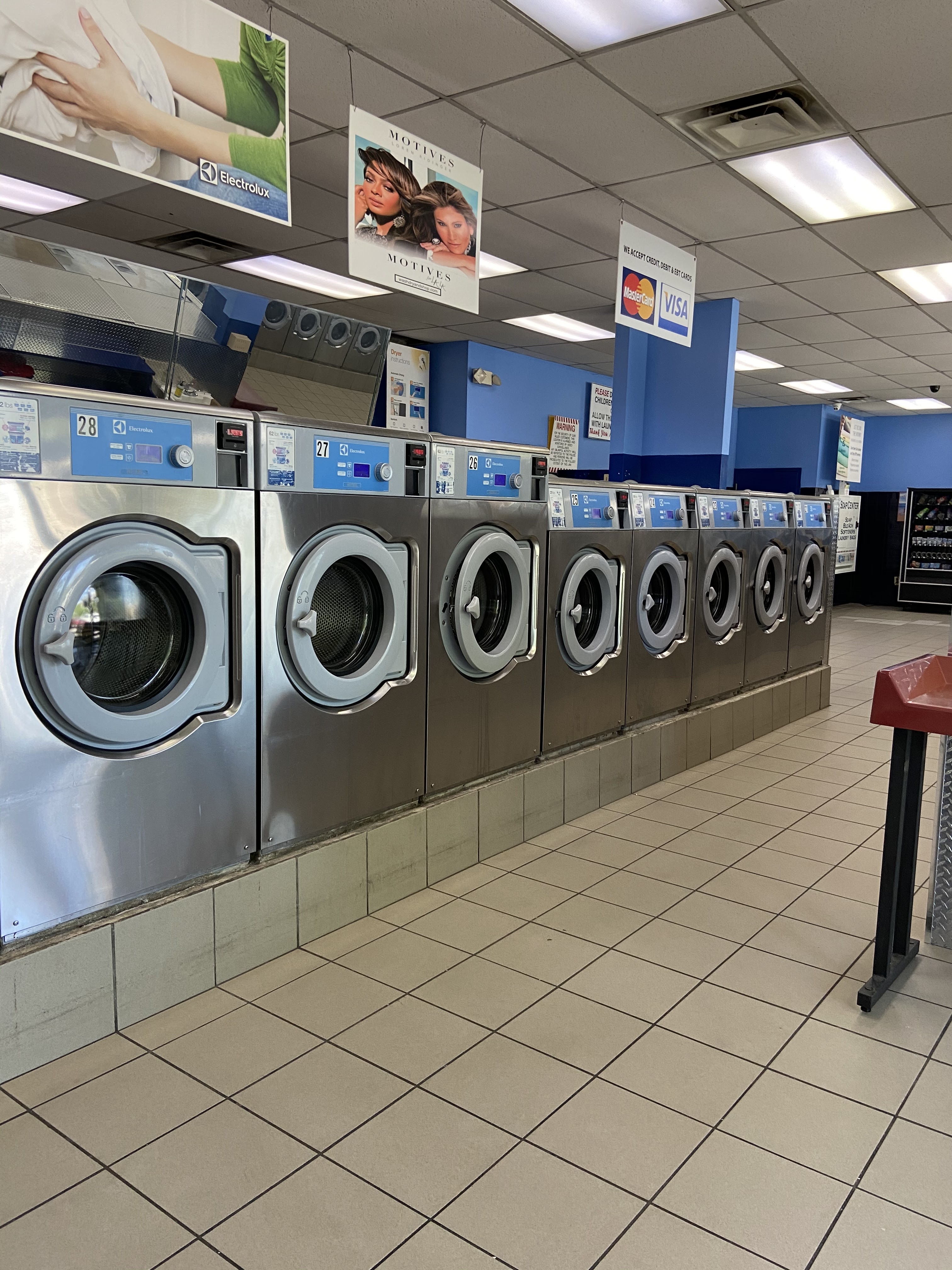 Clean laundry equipment at Super Saver Free Dry Laundromat in Hamden, CT