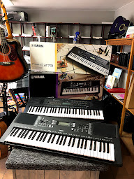 Photo n°30 de Hulot Frères Musique à Busnes (Magasin de musique)